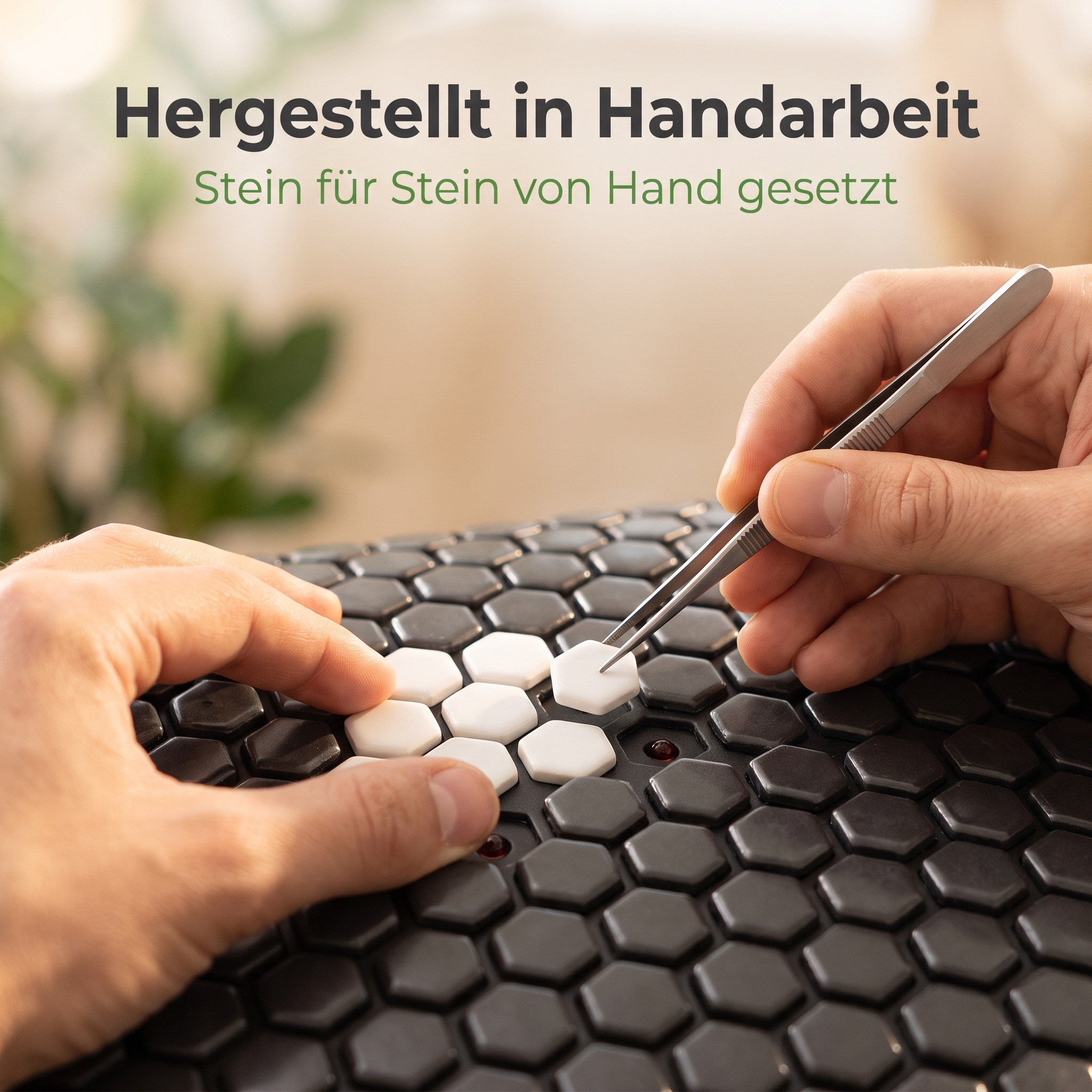 Hergestellt in Handarbeit – hexagonale Steine werden Stein für Stein von Hand auf die MultiSpa Frequenzmatte gesetzt